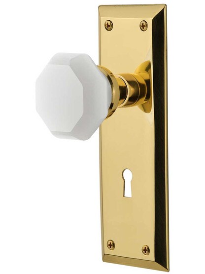 New York Mortise Lock Set with Milk White Waldorf Crystal Glass Knobs in Un-Lacquered Brass.
